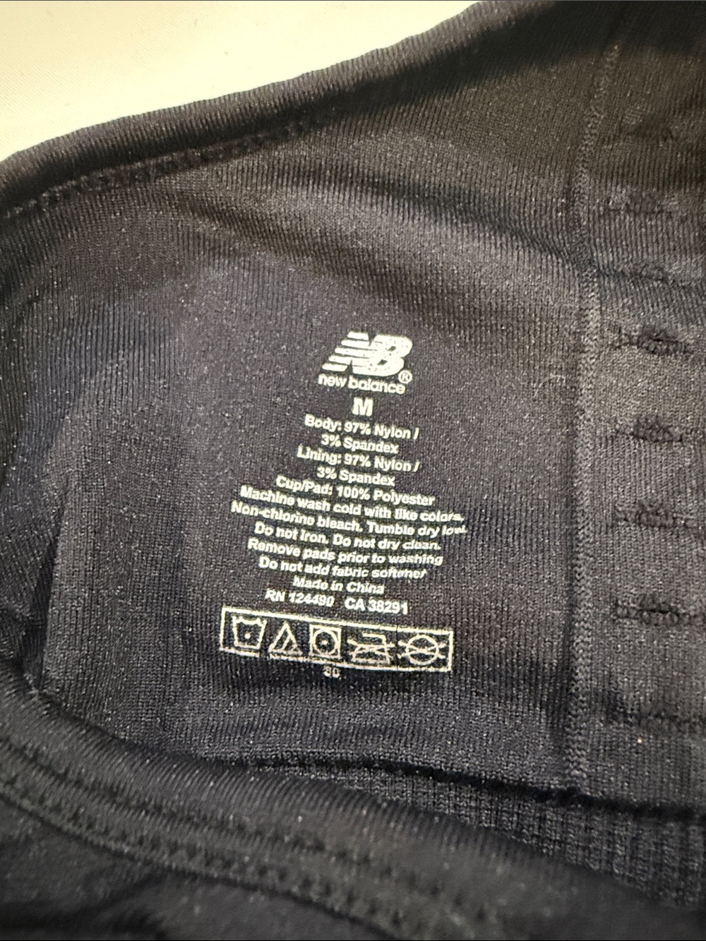 New Balance Black Racerback Logo Sports Bra with Gray Accent - Picture 3 of 3